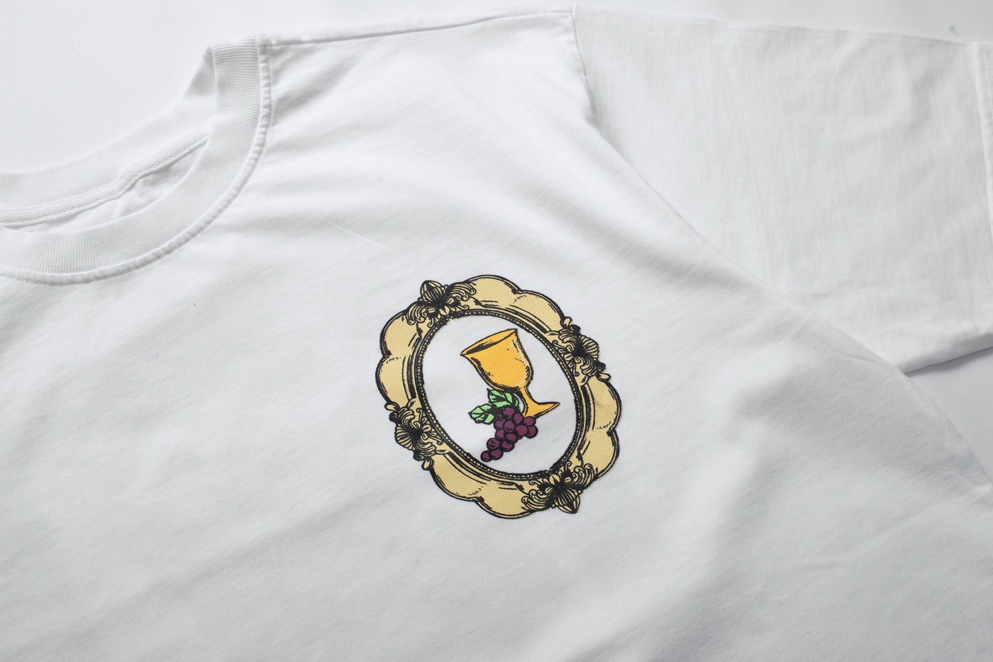 PLAYERA BODEGÓN BLANCO