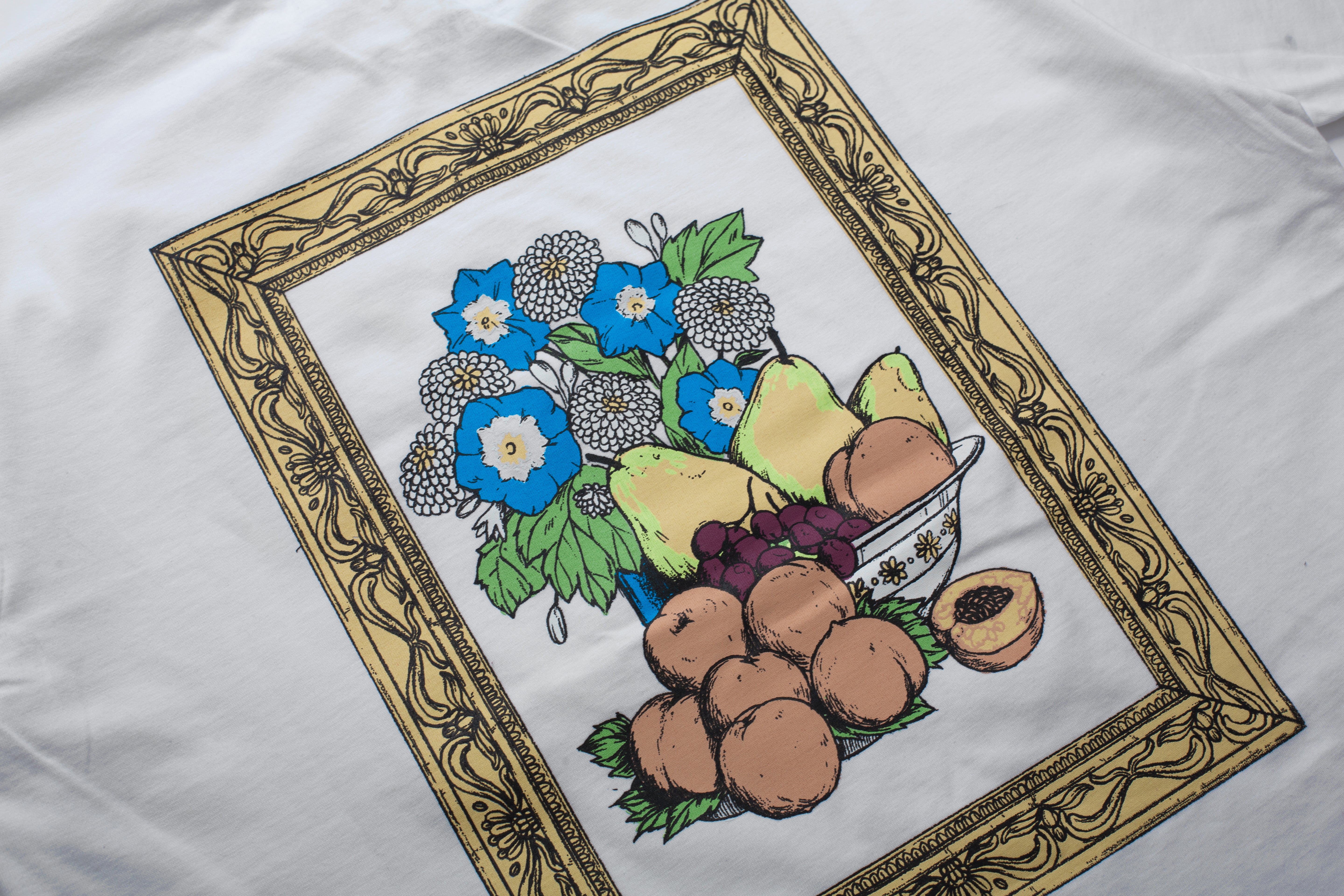 PLAYERA BODEGÓN BLANCO